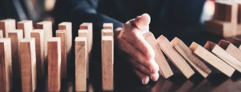 Woman hand stopping risk