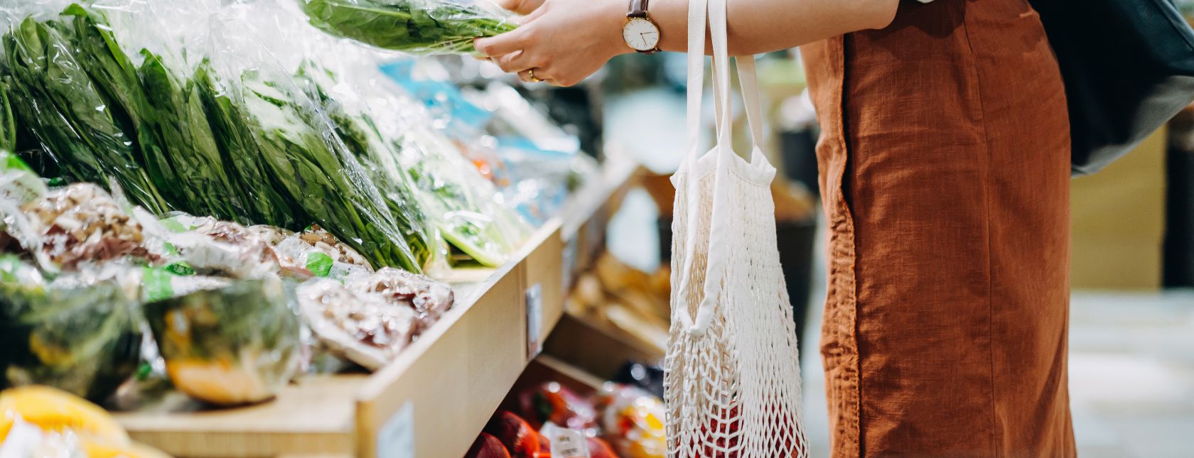 Shopping for fresh organic groceries in supermarket