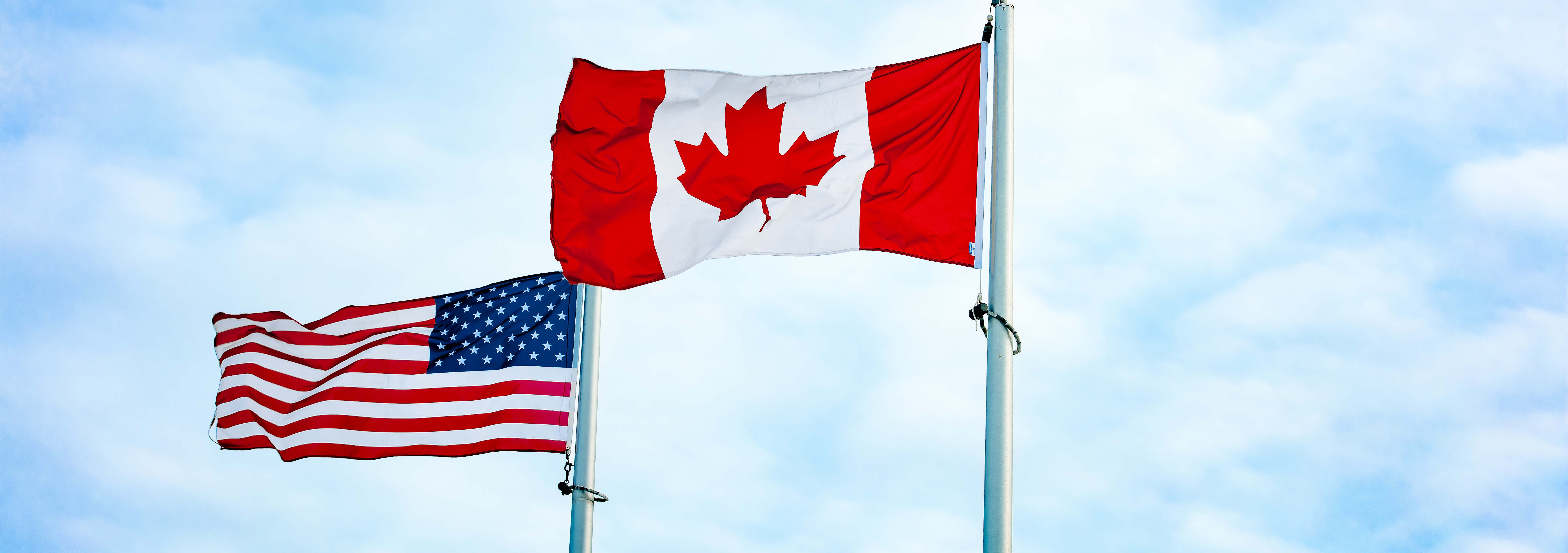 American and Canadian flags