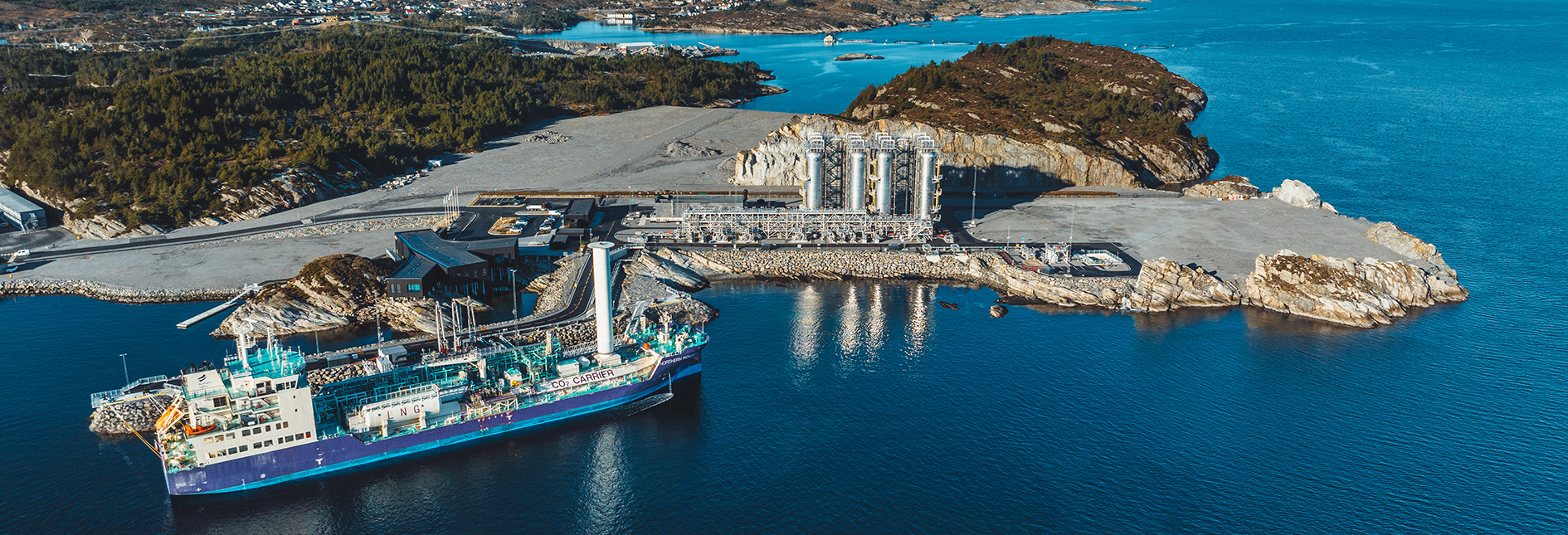 Vessel in front of a storage facility